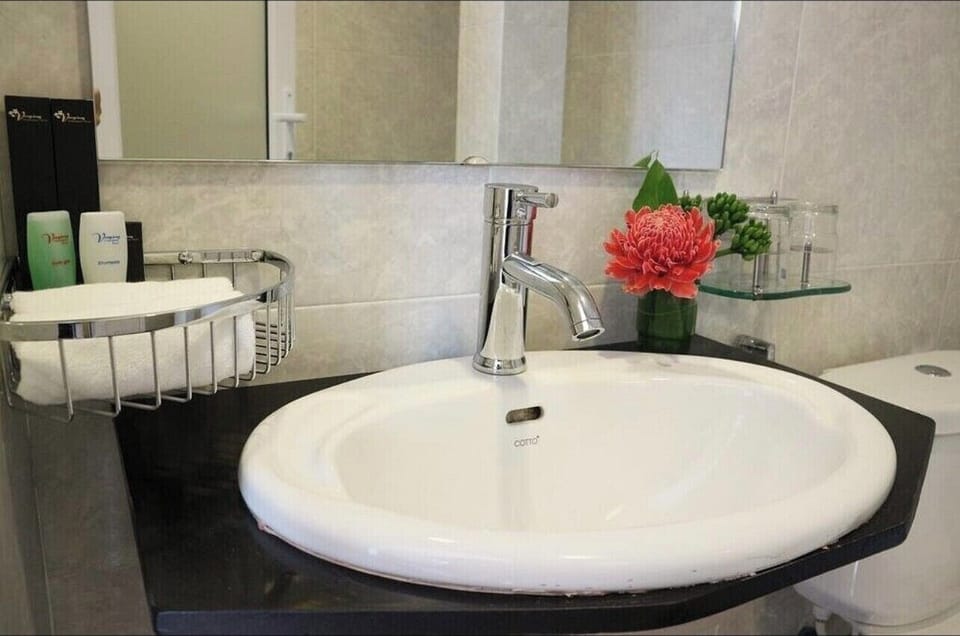 Shower, free toiletries, hair dryer, slippers