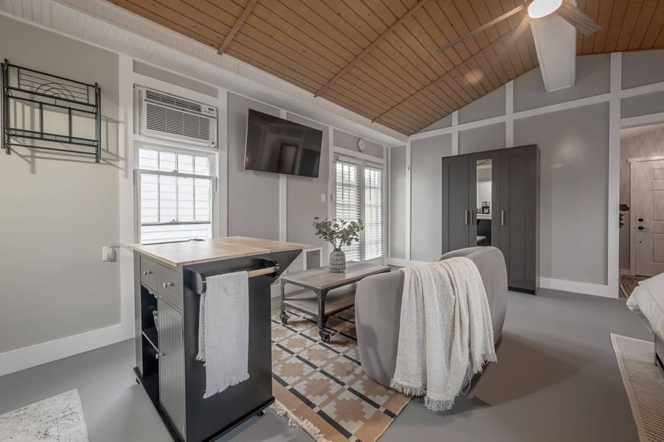 The heart of the cottage:an inviting & stylish interior where you can truly feel at home w/wall mounted flat screen TV for all of your streaming needs