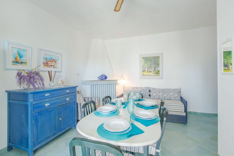 Blue, Furniture, Interior Design, Flooring, Floor, Room, Table, Chair, Ceiling, Home