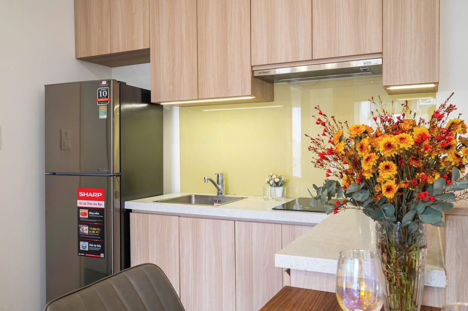Deluxe Room, Balcony, City View | Private kitchen | Dining tables
