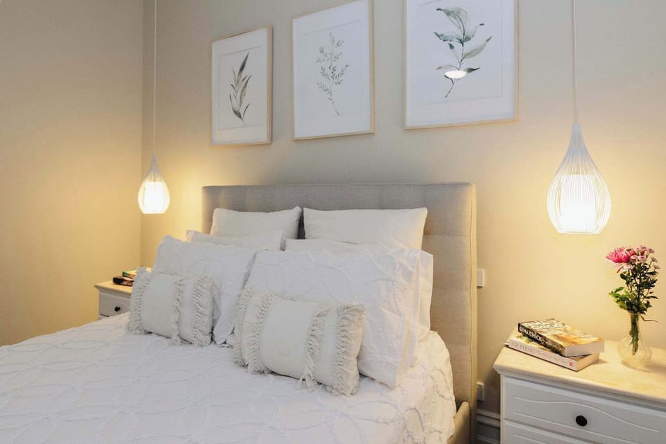 Relax in the spacious main queen bedroom, complete with a private ensuite bathroom for your comfort and convenience.