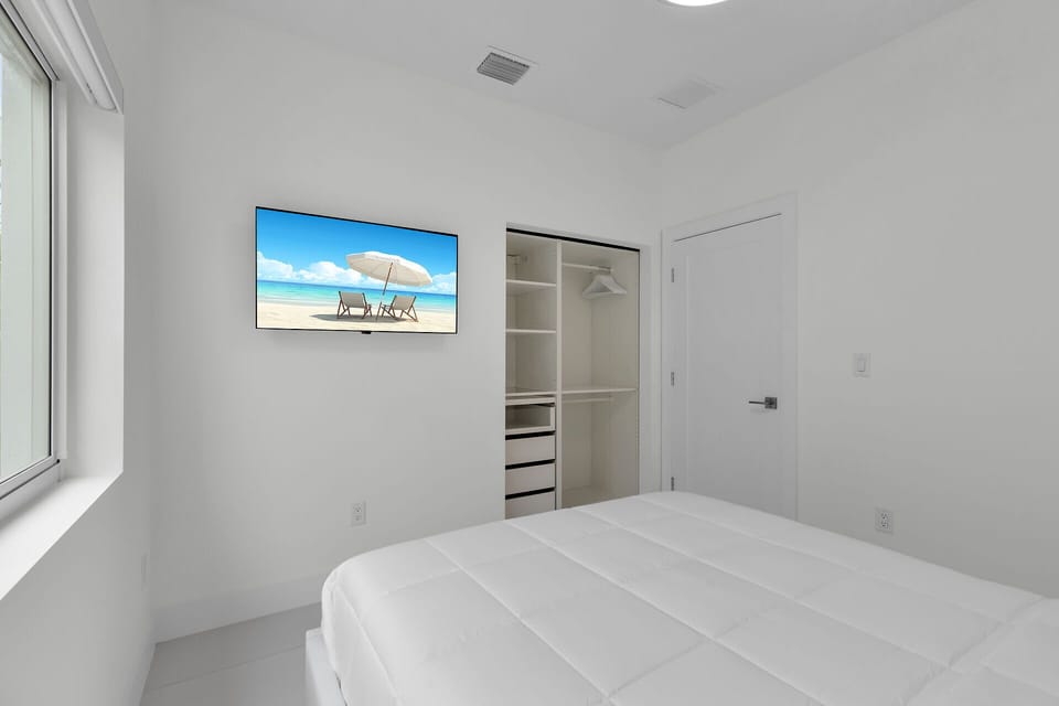 Bright and airy room with beach-inspired decor and stunning ocean views!