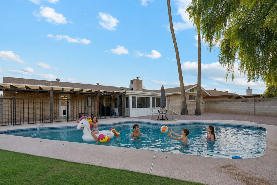 Take a dip in the large sparkling pool in your private, fenced back yard!