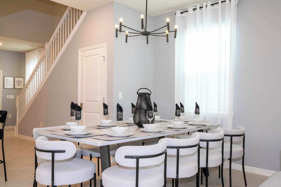 Gather for meals in a chic dining space that’s perfect for family feasts and group celebrations.