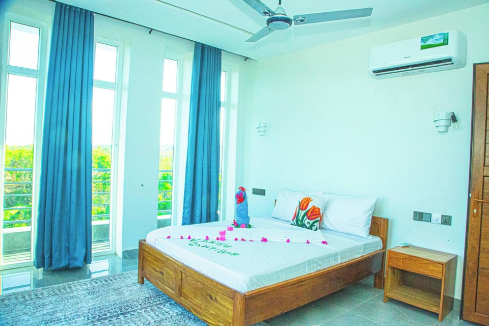 Deluxe Double Room, Balcony, Pool View | In-room safe, laptop workspace, blackout drapes, WiFi (free)