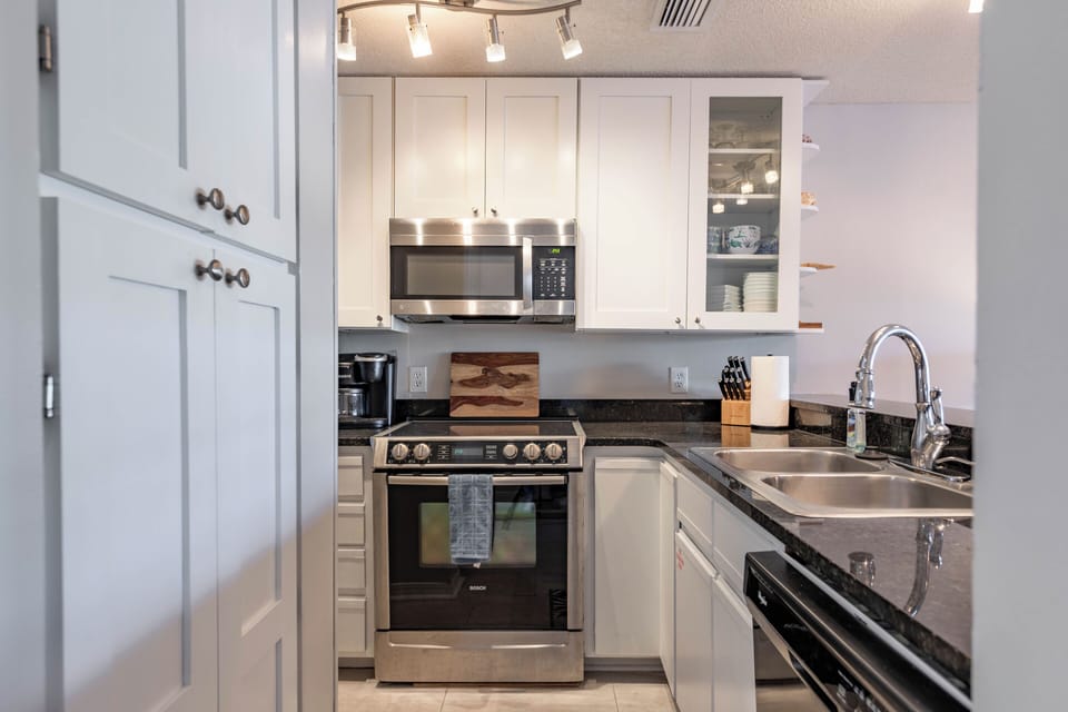 Full Kitchen Upgraded High End Appliances Granite Counter Tops Pantry on Left and Plenty of Cabinets Fully Stocked