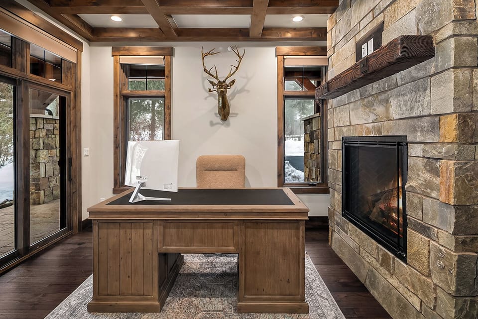 Kokanee Ridge: - Private den with a fireplace and monitor.