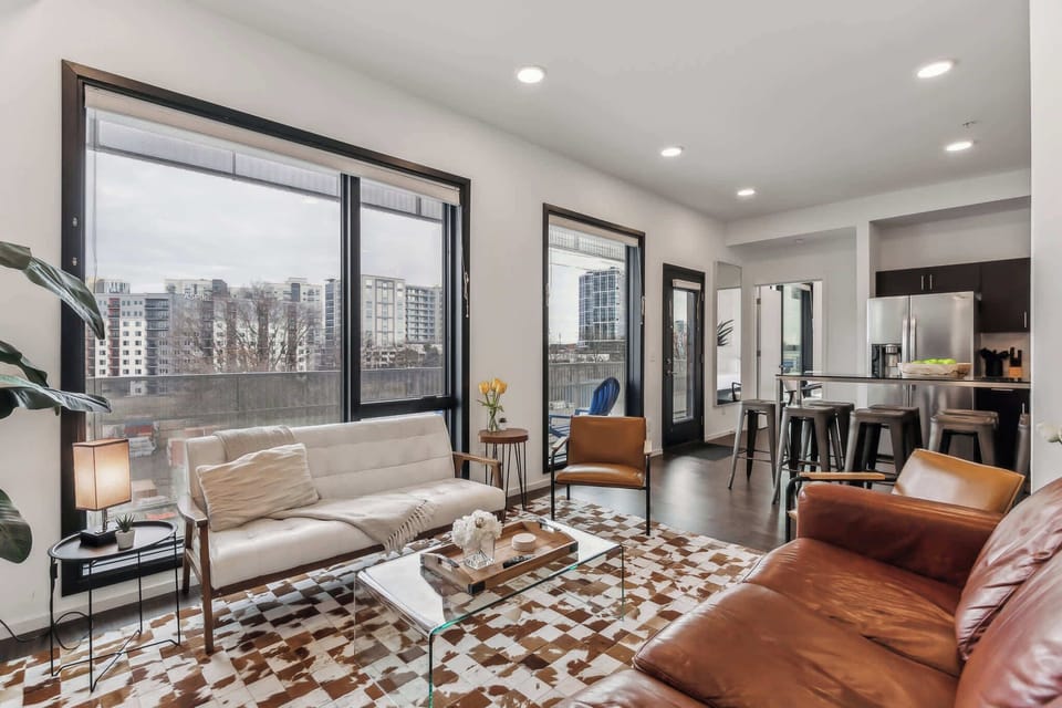 Unwind in the stylish living room & stream your favorites on the smart TV