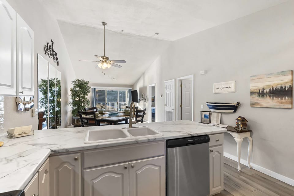 The open, airy kitchen offers ample space & every home comfort