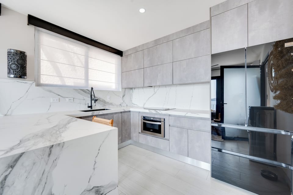 Ample kitchen includes everything you need for your stay.