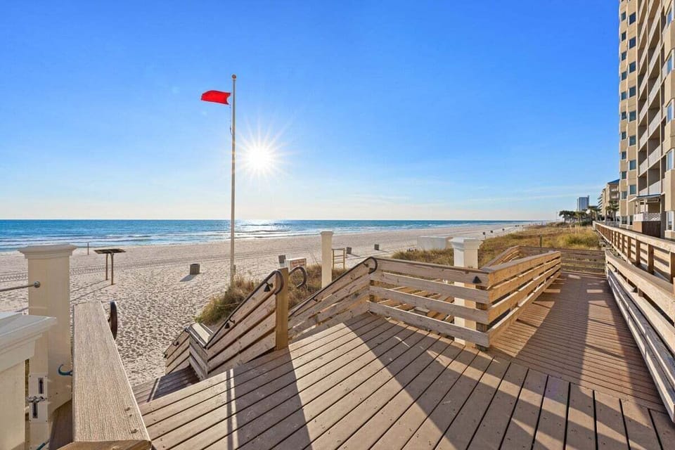 Beach access is located right off the pool deck, making it easy to get your toes in the sand within moments.