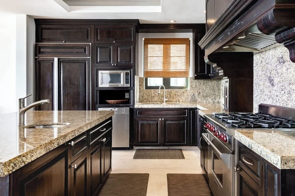 "Fully equipped beach house kitchen with modern appliances"
