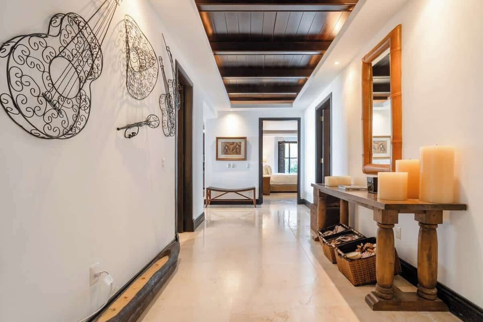 Stylish ground floor condo featuring warm Mexican design—your coastal escape with local soul