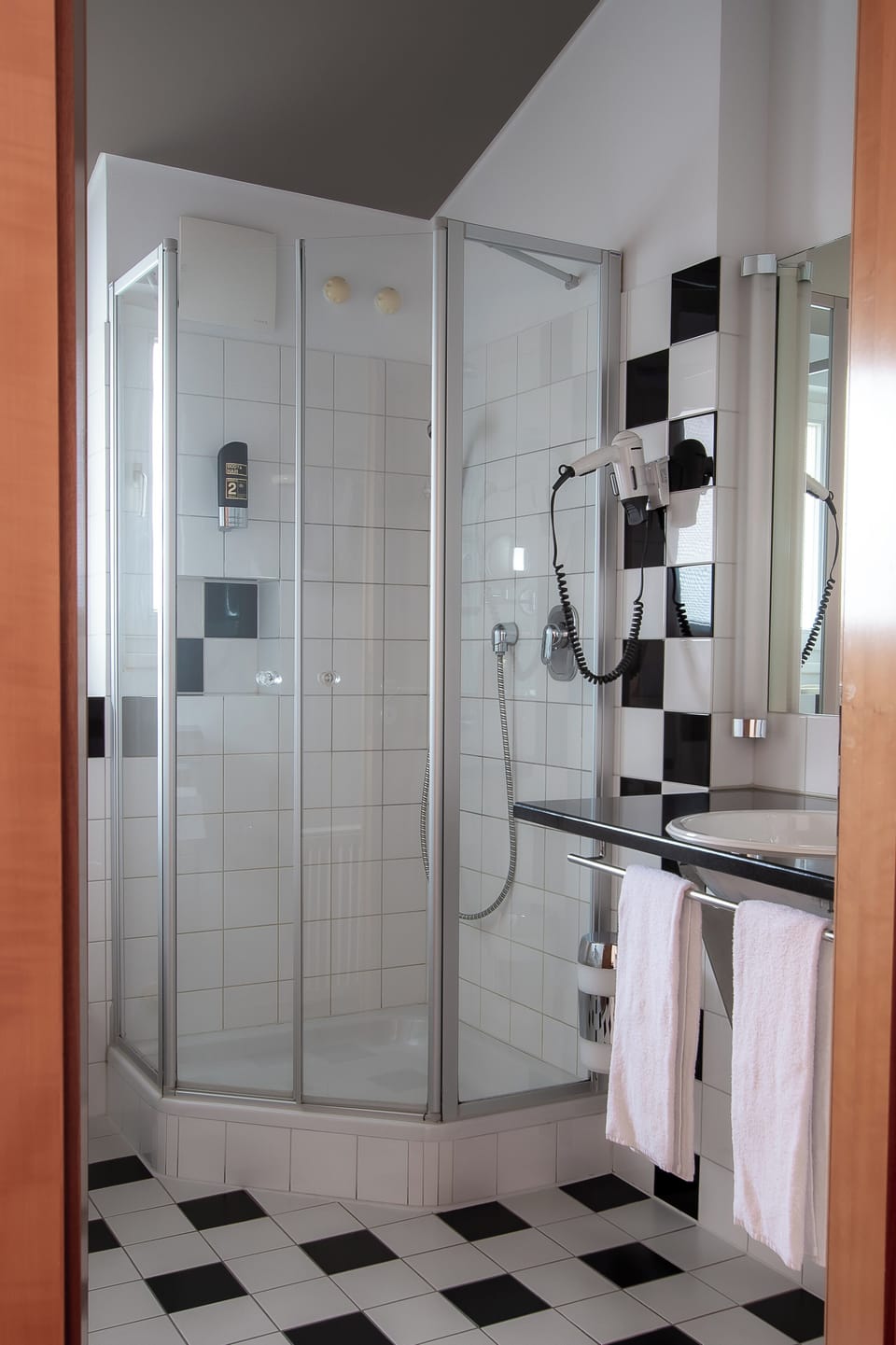 Hair dryer, slippers, towels, soap