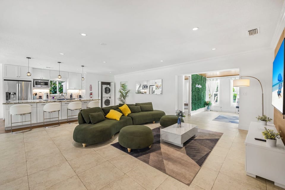 Exclusive House, Patio | Living area | 50-inch plasma TV with cable channels