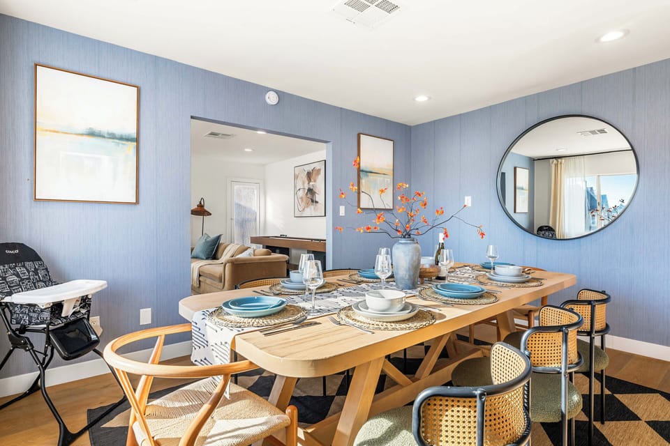 Stepping from the living room you will greet a  dining area with seatings for 8.