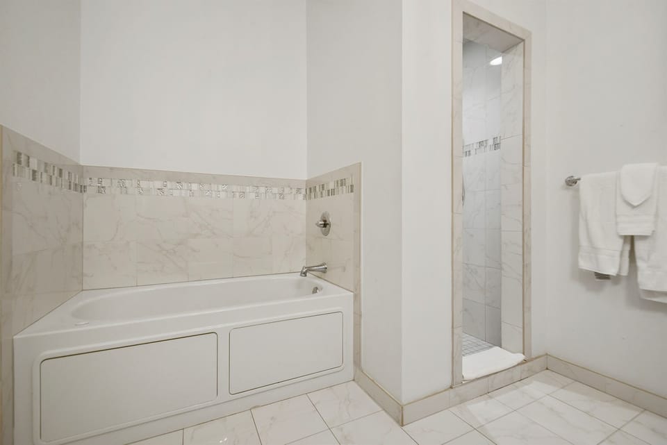 Bolden Bathroom with Bathtub and Walk-In Shower