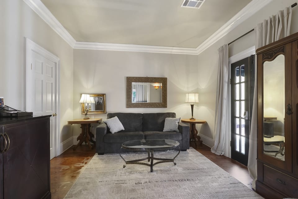 Living room with queen sleeper sofa and Roku TV