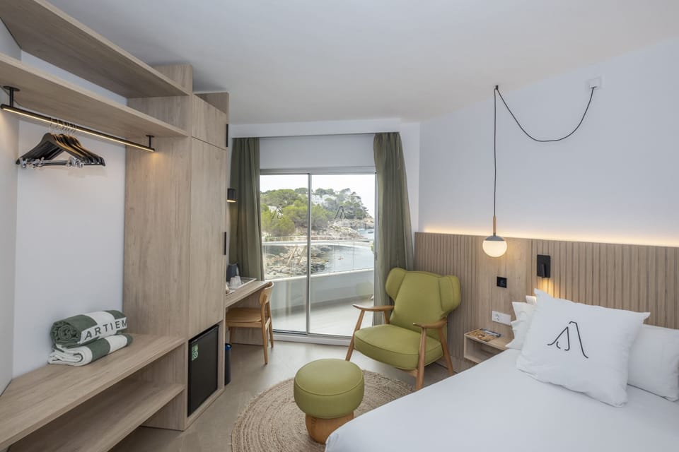 Premium Double Room, Balcony, Sea View | Minibar, in-room safe, desk, laptop workspace