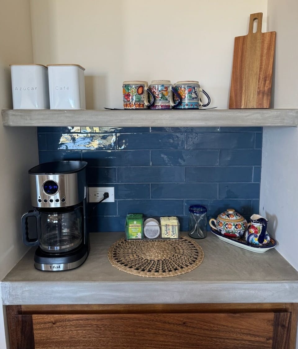 Kickstart your day at the coffee bar, complete with coffee and tea supplies