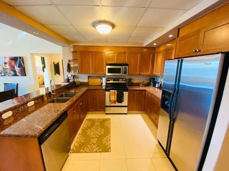 The kitchen is spacious and well-equipped