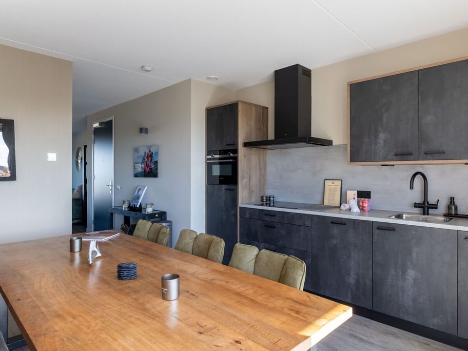 Wood, Furniture, Flooring, Countertop, Floor, Cabinetry, Interior Design, Kitchen, Apartment, Ceiling