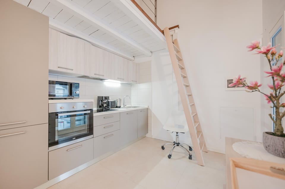 Comfort Condo | Private kitchen | Stovetop, espresso maker, electric kettle, cookware/dishes/utensils