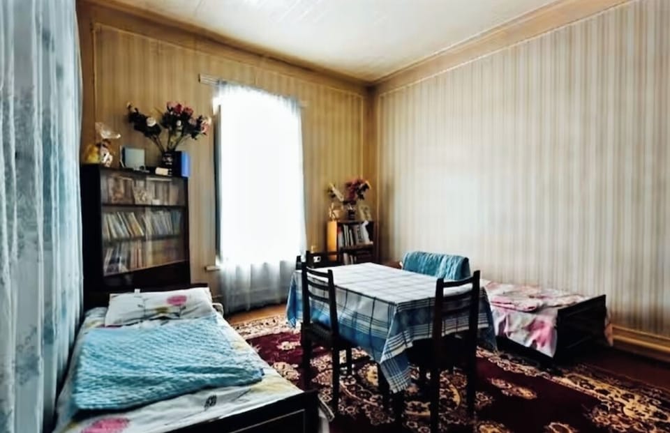Family Twin Room, Courtyard View | Laptop workspace, blackout drapes, iron/ironing board, free WiFi