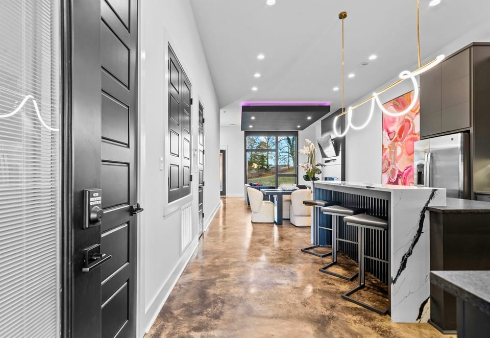 A sleek and welcoming hallway invites you into the heart of the home, setting the tone for modern comfort and effortless style.