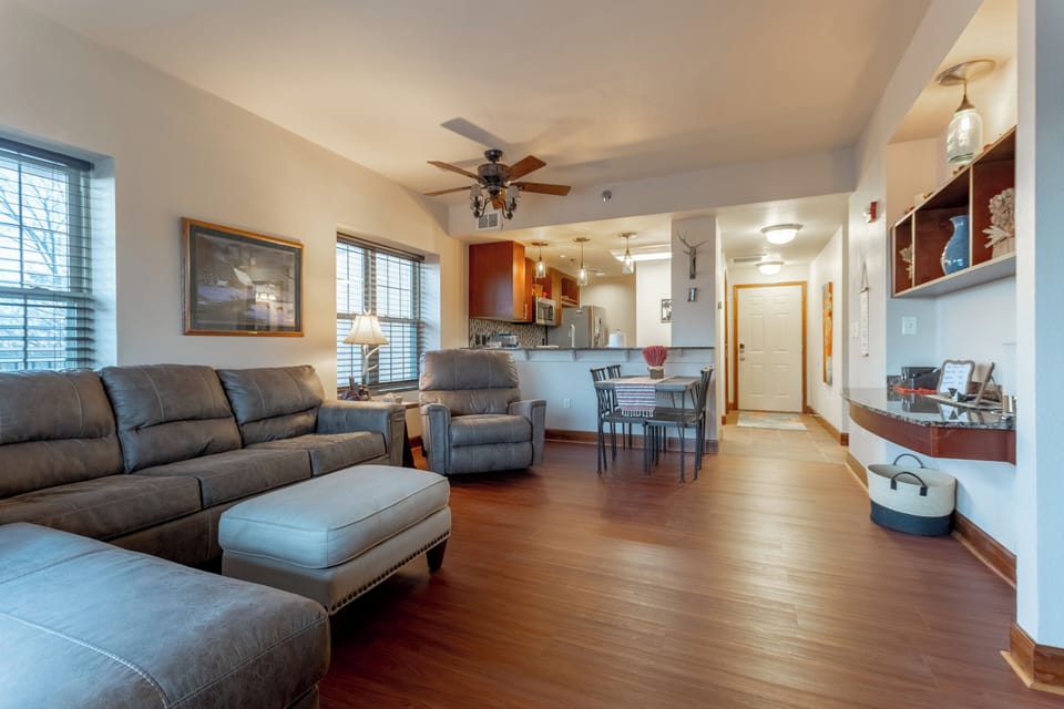 Livingroom room with sectional queen sleeper sofa ,  recliner chair