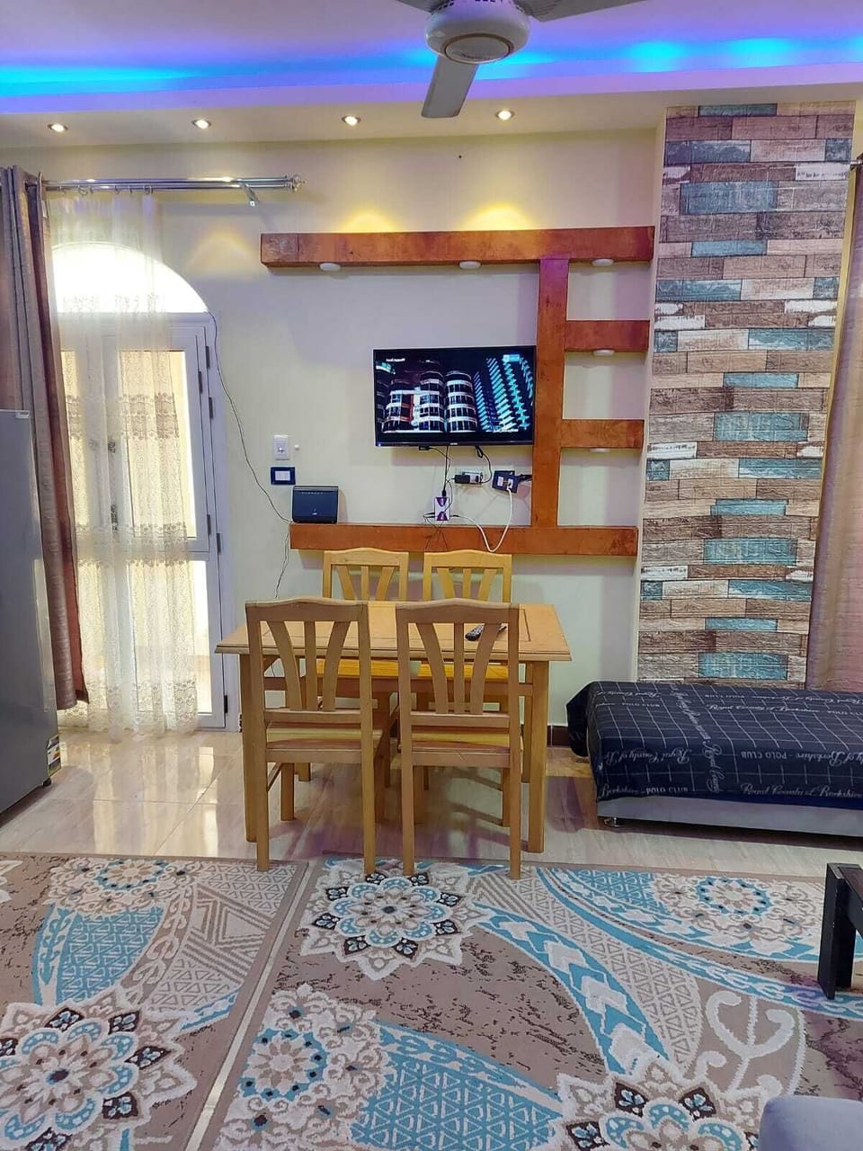 Family Apartment, Balcony, City View | In-room dining