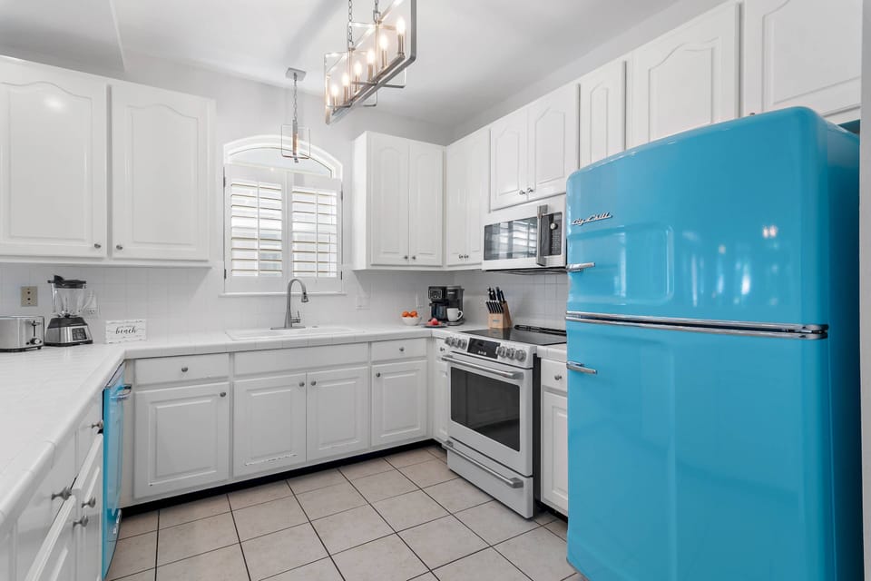 Bright Clean Kitchen with Fun Retro Big Chill Refrigerator & Dishwasher