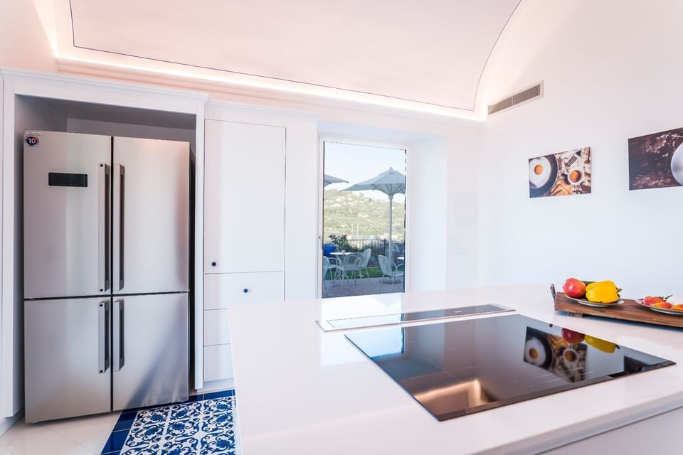 Luxury Villa | Private kitchen | Fridge, microwave, oven, stovetop