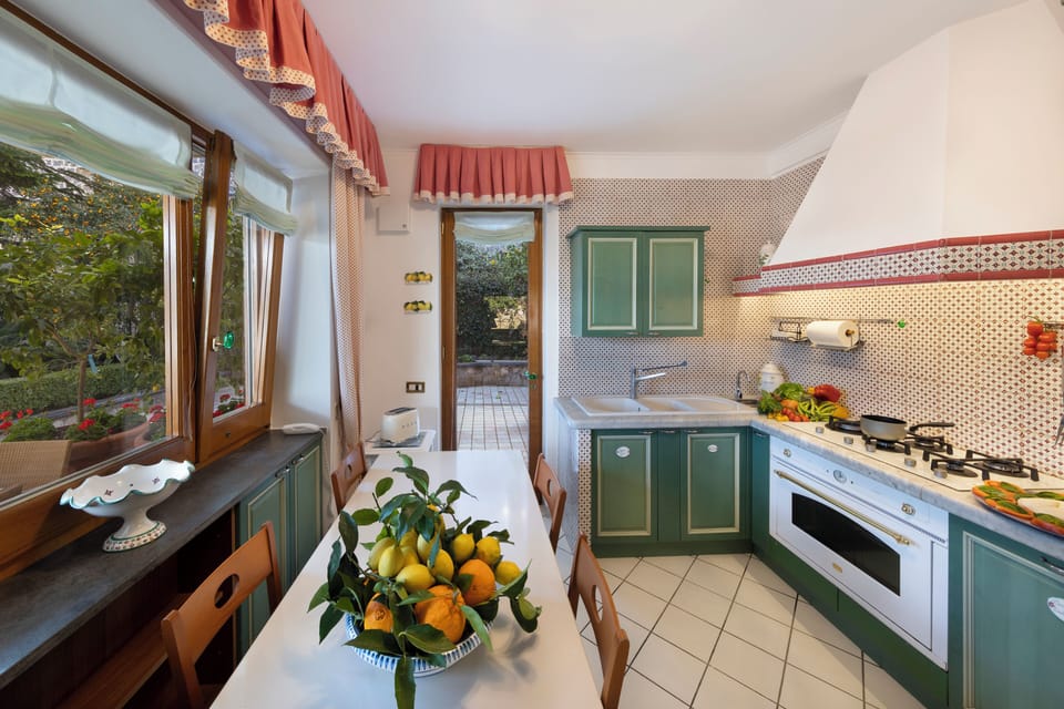Villa | Private kitchen | Espresso maker, coffee/tea maker, full-size fridge, oven