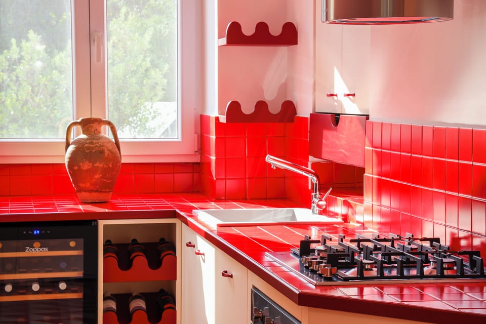 Villa | Private kitchen | Fridge, oven, stovetop, highchair