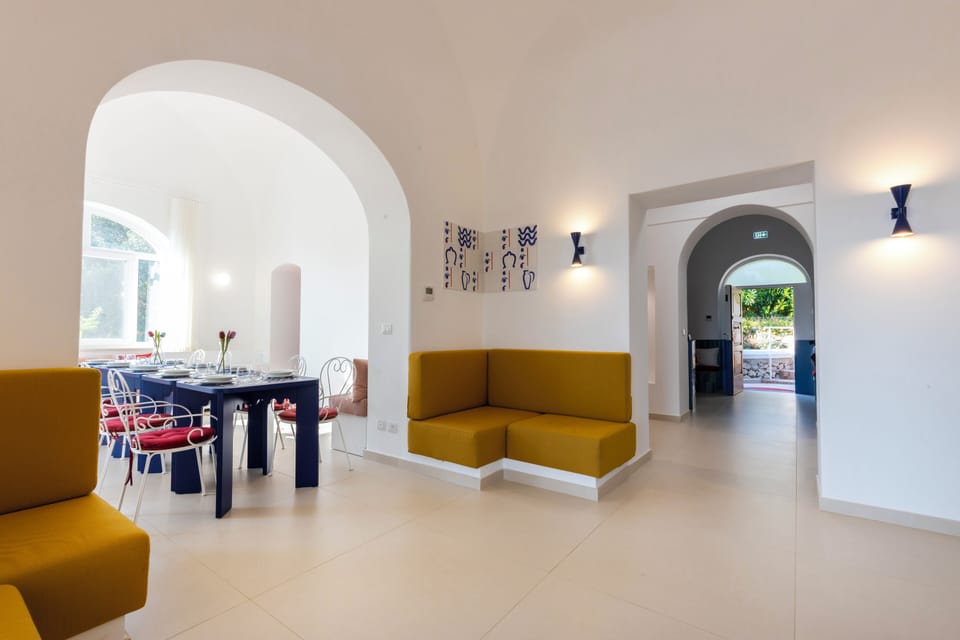 Villa | Living area | 40-inch flat-screen TV with satellite channels, fireplace