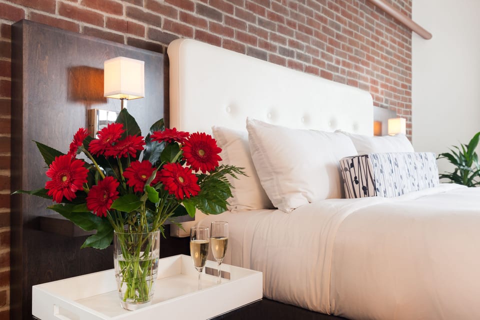Premium bedding, down comforters, pillowtop beds, minibar