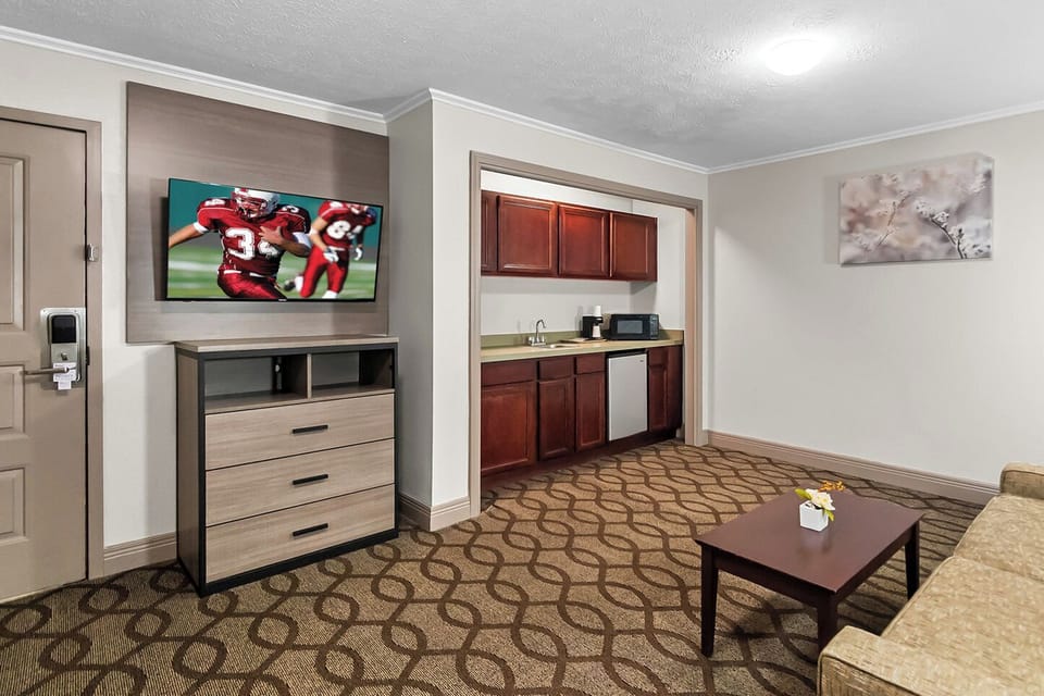 Suite, 2 Bedrooms, Non Smoking, Jetted Tub (1 King Bed) | Desk, laptop workspace, blackout drapes, iron/ironing board