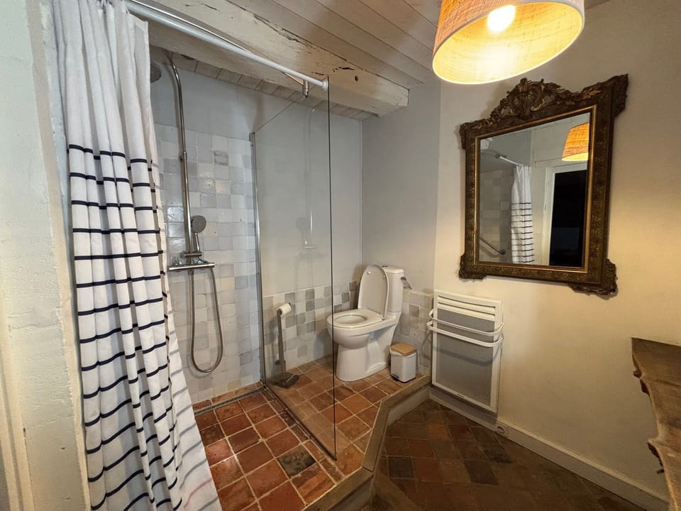 Family Apartment, 2 Bedrooms, Courtyard View | Bathroom | Hair dryer, towels, soap, shampoo