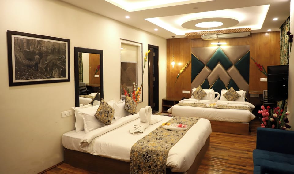Family Suite, City View | Down comforters, minibar, desk, laptop workspace