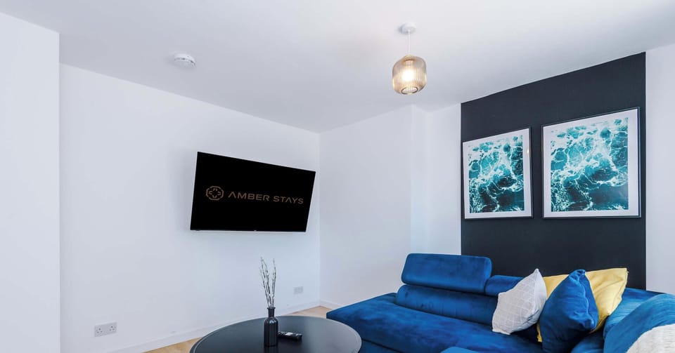 A bright and welcoming living room with comfortable seating, soft lighting, and thoughtful décor. The open layout creates a perfect space for relaxing, entertaining, or enjoying quiet moments