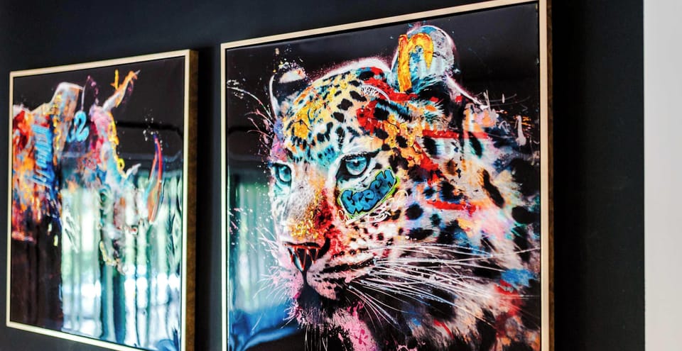 This striking abstract wall art adds a bold and creative touch to the home’s interior. 