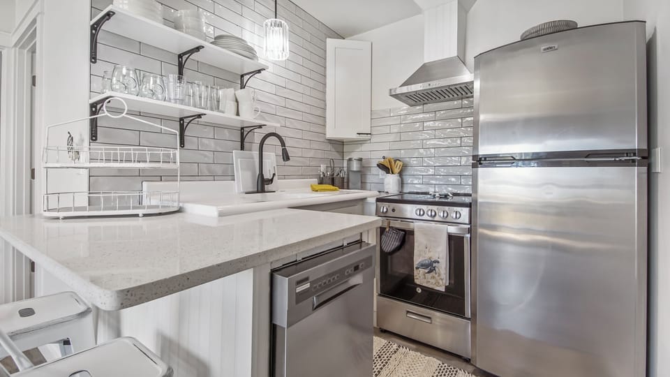 The full kitchen is quaint, but it provides everything you need for a good stay.