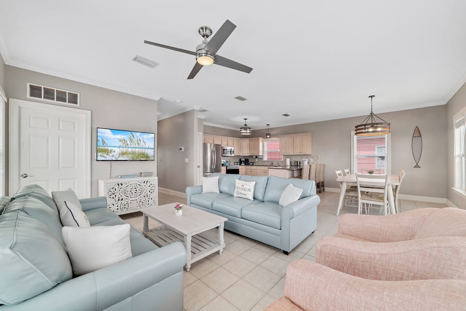 Open concept living room, kitchen, and dining for all guests to enjoy!