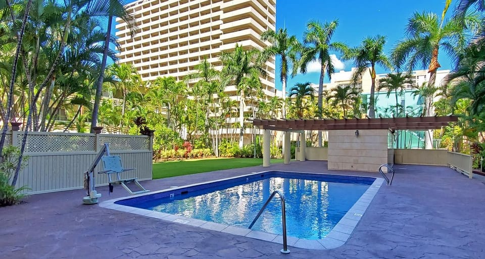 large pool with sauna and large back yard grassy area