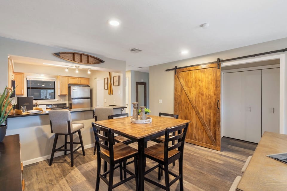 The barn door closes to help with noise reduction to the bedrooms.