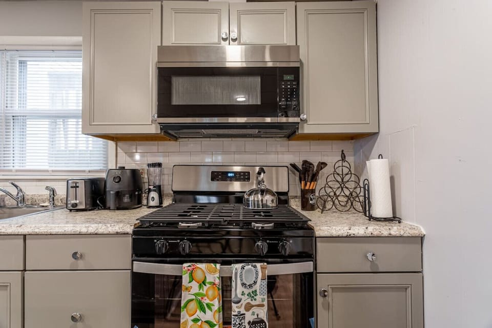 Floor 1 - Full kitchen with gas range and modern appliances