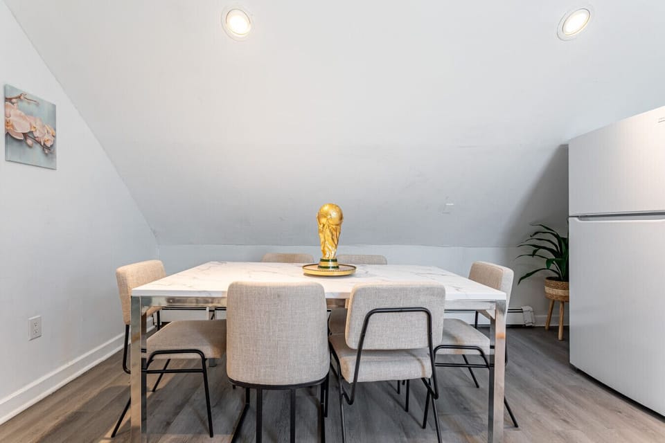 Dining table seats 8 — full group meals around one table.