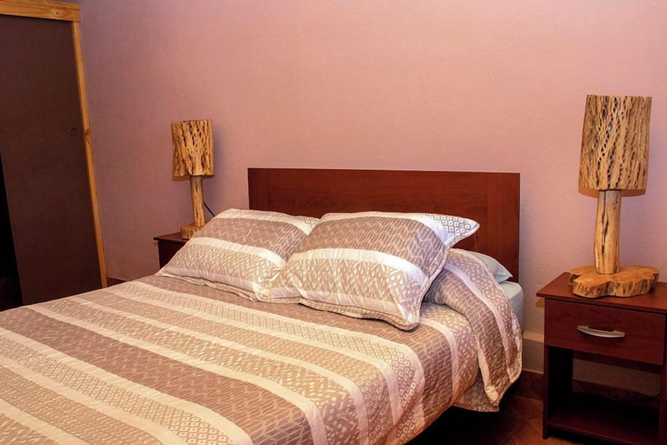 Standard Double Room, 1 Double Bed, Private Bathroom, Courtyard View | In-room safe, blackout drapes, free WiFi, bed sheets