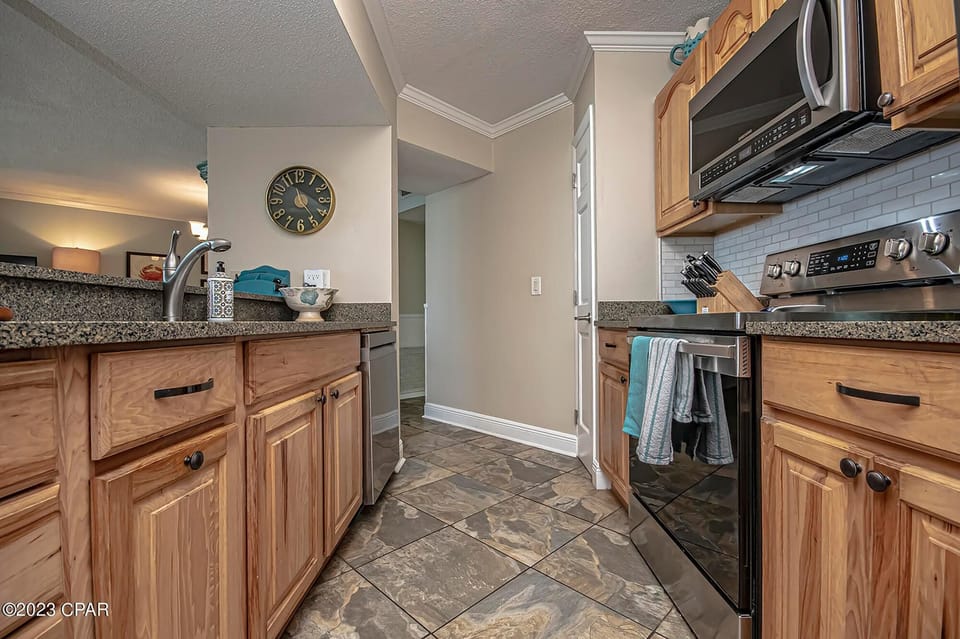 Condo, Multiple Beds (Dunes of Panama 1104E) | Private kitchen | Oven, toaster